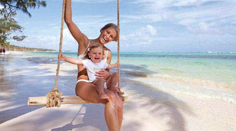 mom and baby on the beach